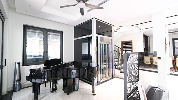 bảng giá thang máy buồng kính
