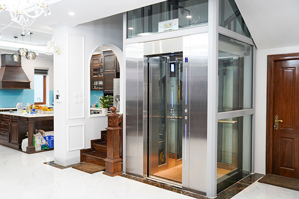 thang máy huy hoàng kính cường lực